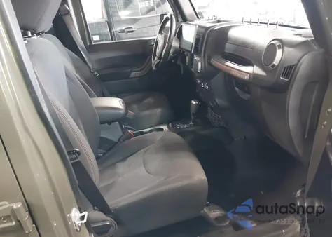 2015 Jeep Wrangler Unlimited Willys Wheeler z USA, uszkodzony, nr VIN 1C4BJWDG8FL753993